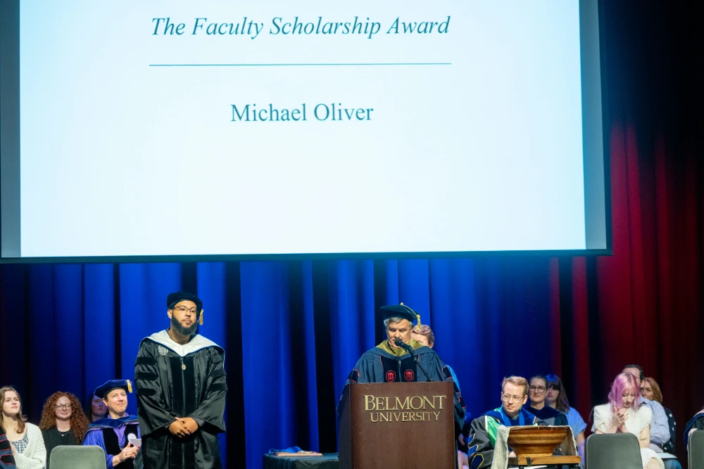 Dr. Oliver accepting his award