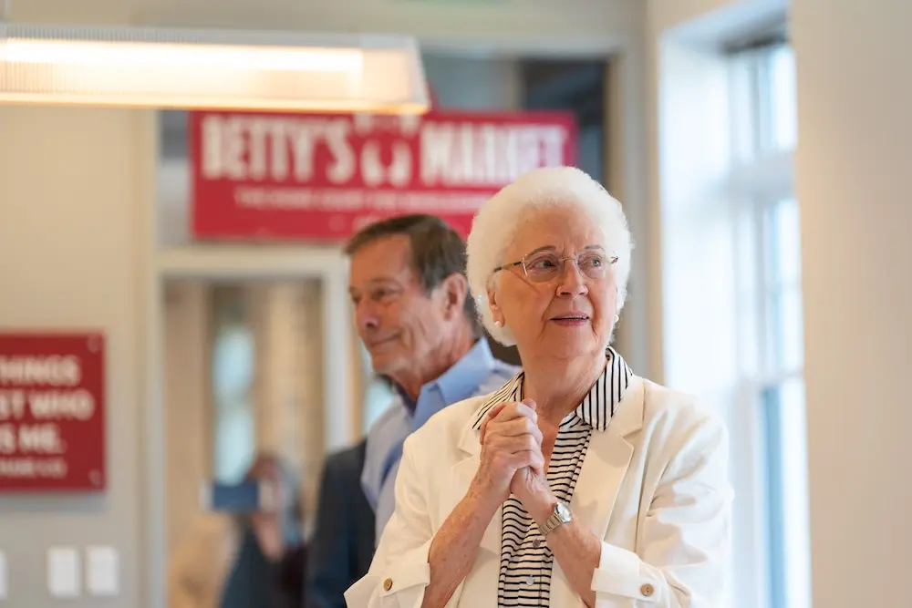 Betty Wiseman with Betty's Market in background