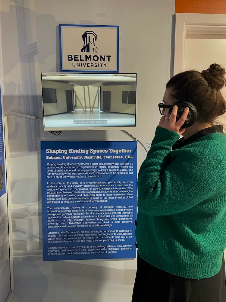 Museum patron watches documentary