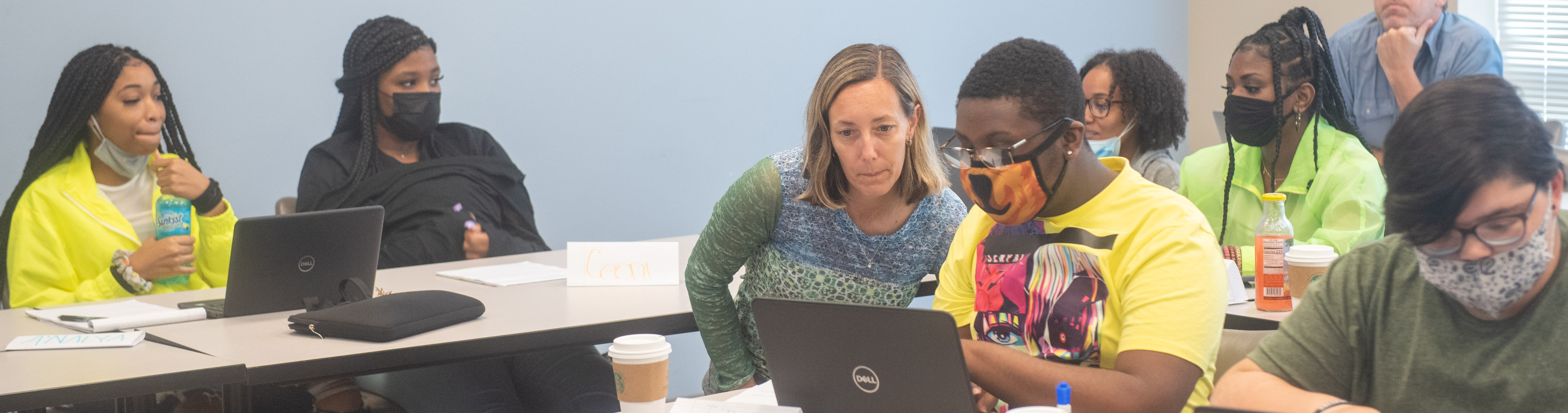 Students learning in a classroom.