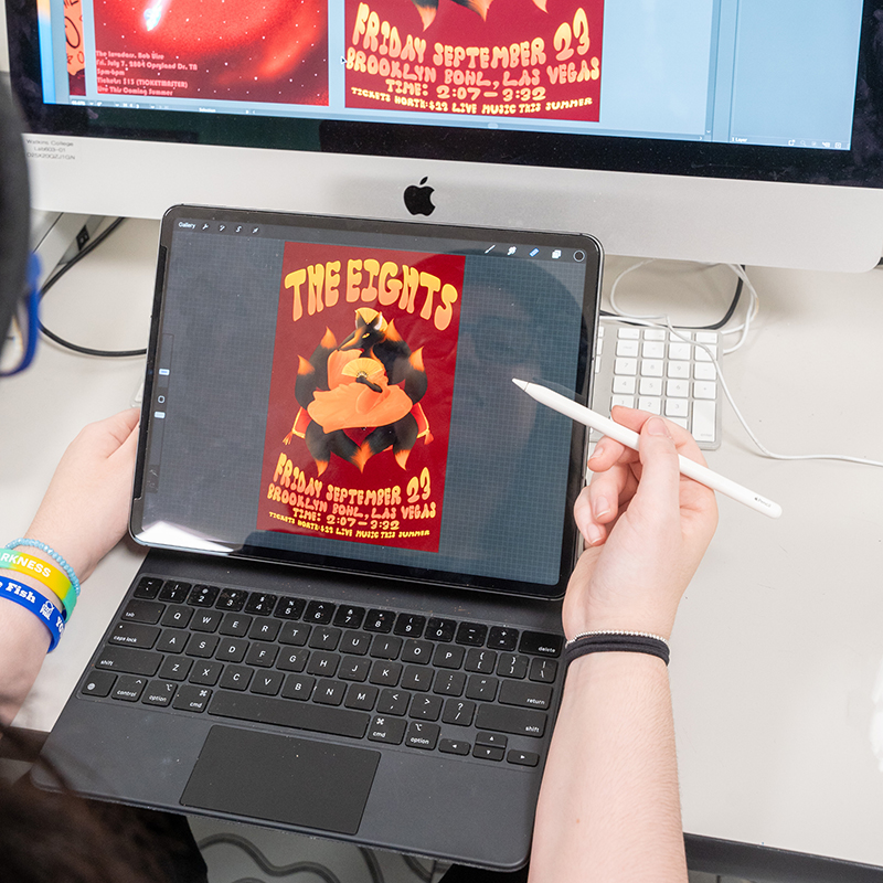 Detail image of a hand drawing on an iPad with an apple pencil.